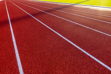 Red running track in stadium