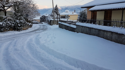 Fototapeta premium road snow trees winter ice traffic cars
