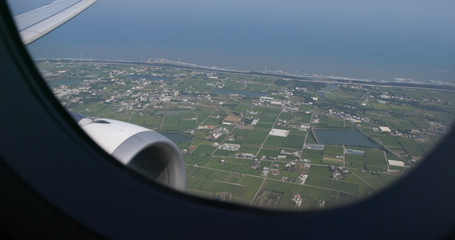Fototapeta na wymiar Window view from the aircraft