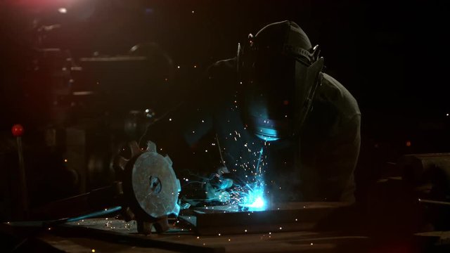 Super slowmotion footage of welding person, 1000fps at 4K