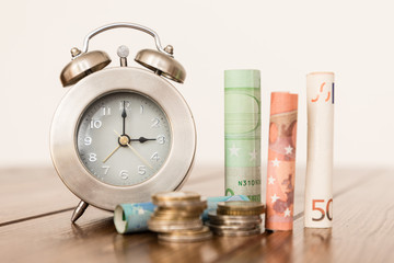 clock with money, time is money