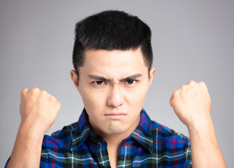 asian man with angry and mad face