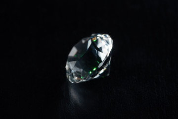 clear big diamond on black background