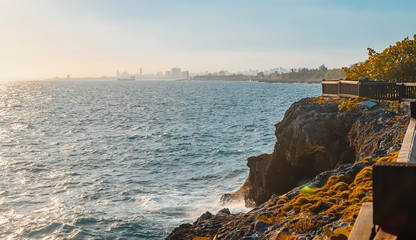 Caribbean sea view of Santo Domingo as golden tropical sunset