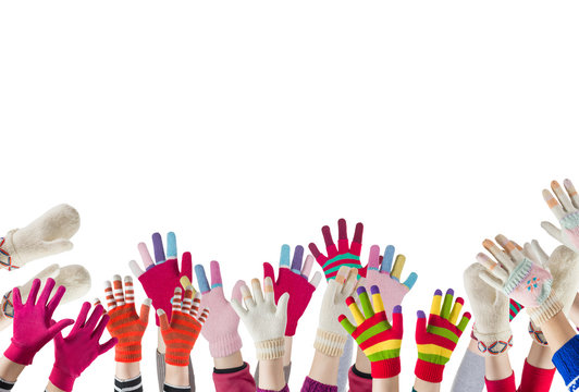 children hands with winter gloves and mittens isolated