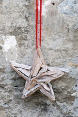 star-shaped decorative accessory handmade out of wood