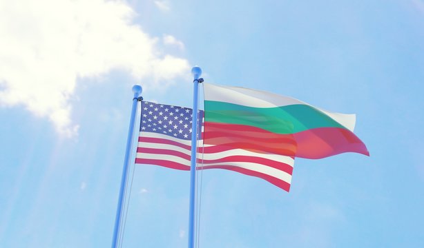 USA and Bulgaria, two flags waving against blue sky. 3d image