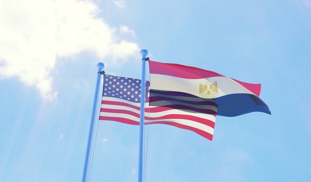 USA and Egypt, two flags waving against blue sky. 3d image