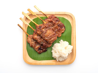 grilled skewered milk pork with white sticky rice