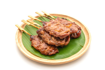grilled skewered milk pork with white sticky rice