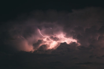 Fototapeta na wymiar Lightning storm in summer day