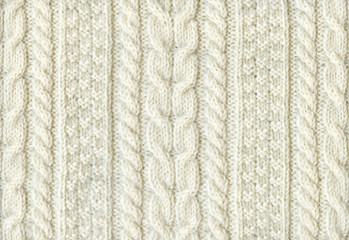 手編みの白のセーター 模様編みのテクスチャ