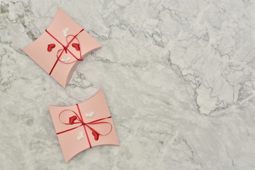 Beautiful valentines day paper hearts on light marble background. romantic background greeting card
