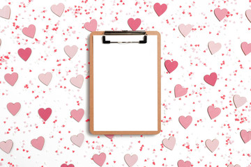 Clipboard mock up. Texture made of colorful hearts on a white background