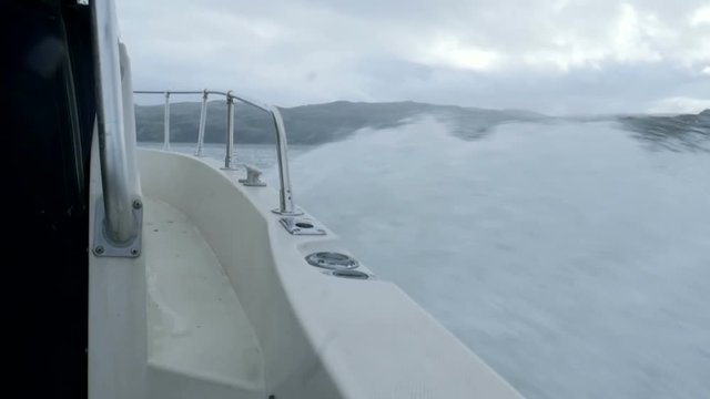 Slowmotion waves under the motor boat at Barents sea