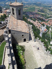 View of the main fortification of the Guaita tower  and the slopes of Monte Titano, the Republic  of San Marino, Italy