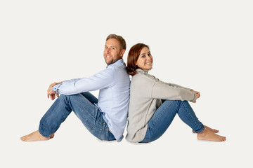 Young attractive smiling couple thinking of future or past together isolated on white and copy space