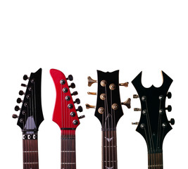 The heads of the vultures of guitars. Isolated on white