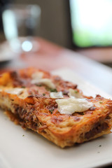 Beef lasagna on wooden background , Italian food