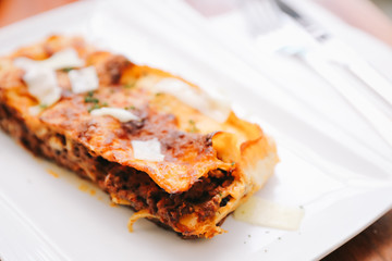 Beef lasagna on wooden background , Italian food