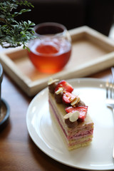 Strawberry cake dessert sweet food with strawberry nuts amd cake on wooden table
