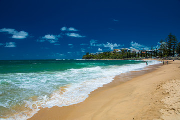 CALOUNDRA, AUS - DEC 28 2018: Hot sunny day at Moffat Beach, Calundra, Queensland, Australia