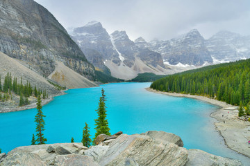 Beautiful turquoise waters of the Moraine lake in Banff National Park, Alberta, Canada