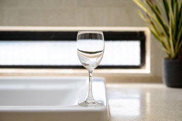 Empty Wine glasses in bathroom background
