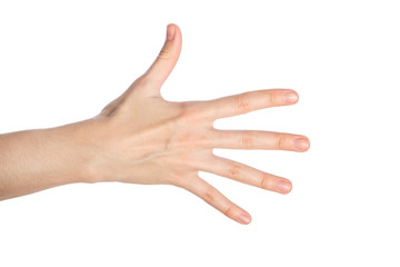 Woman hand shows numder five gesture isolated on a white background