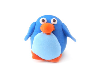 Kid's modelling clay pinguin isolated on white background