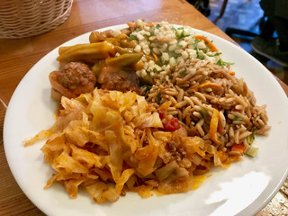 Turkish Olive Oil Healthy Food Plate with Cabbage Stew Kapuska, Orzo Barley, Wheat Salad, Okra and Meatballs.