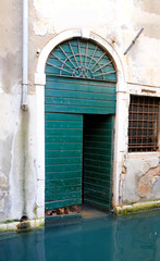 Fototapeta na wymiar Old door in Venice, Italy