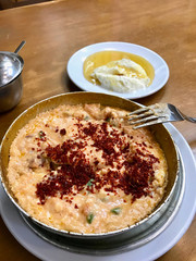 Turkish Breakfast  Menemen with Butter Cream and Honey at Restaurant.