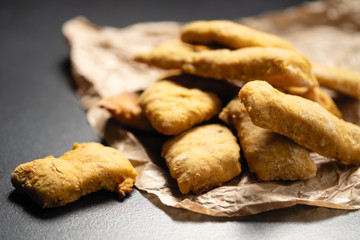 homemade pastries, fresh pumpkin cookies stacked in stacks, and tied with a slice on a dark background