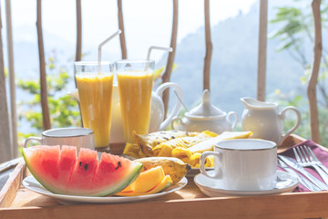Beautifully served breakfast on terrace or balcony