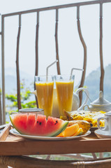 Fototapeta premium Beautifully served breakfast on terrace or balcony