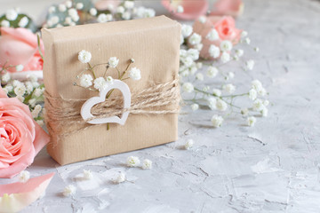 Gift boxes with small white flowers and hearts