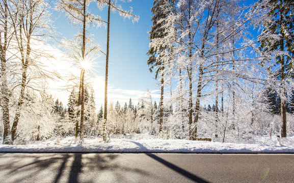 Snow-covered landscape with sunset. Schneebedeckte winterlandschaft.