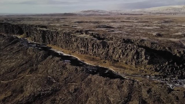 Drone footage of Iceland. footage of a waterfall in Thingvellir Iceland.