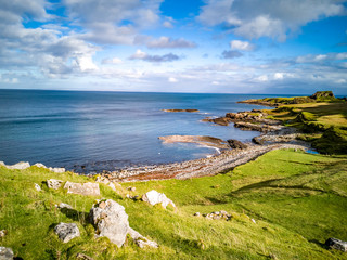 Fototapeta na wymiar The coastline with the rare Dinosaur footprints of the sauropod-dominated tracksite from Rubha nam Brathairean, Brothers Point - Isle of Skye, Scotland