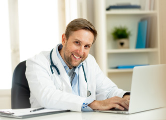Portrait of successful specialist doctor working in hospital office looking happy and confident