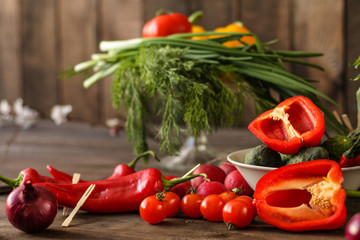 salad from fresh vegetables (tomato, cucumber, radish, pepper, arugula and other vegetables). copy space. top