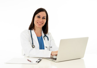 Female doctor having online consultation with patient and working on laptop isolated on white