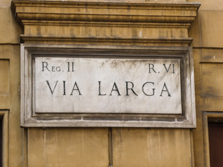 Street name sign of Via Larga in Rome, Italy, historical street close to Piazza Navona