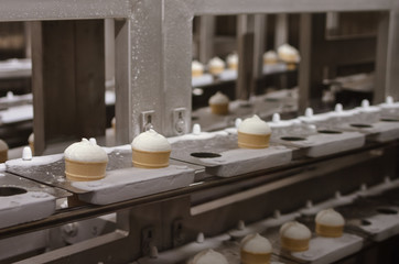 Fototapeta na wymiar ice cream on a conveyor belt