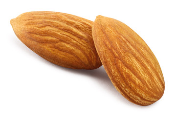 Close-up of two almonds, isolated on white background