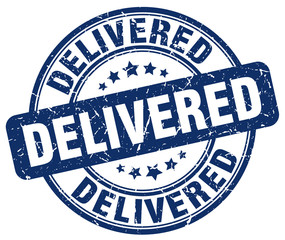 delivered blue grunge stamp