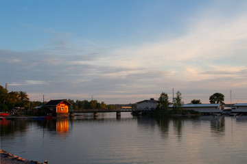 The coast of the Gulf of Finland and the park in the city of Helsinki in Finland on a summer evening.