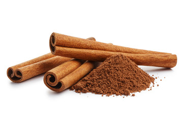 Cinnamon sticks and powder, isolated on white background