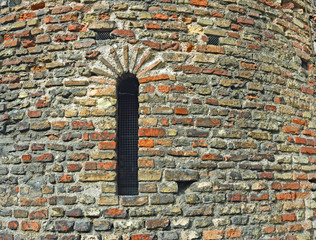 Italy Ravenna, small window in a medieval bell tower.